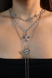 Platinum Plated Diamond Cross of Hearts Necklace