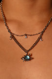 Platinum Plated Moonstone Saturn Star Necklace