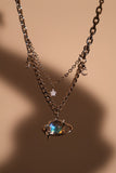 Platinum Plated Moonstone Saturn Star Necklace