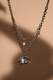 Platinum Plated Moonstone Saturn Star Necklace